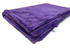 Reusable waffle-weave microfiber towel designed for efficient car drying and detailing. The lint-free, edgeless construction delivers a streak-free finish without scratching delicate surfaces.