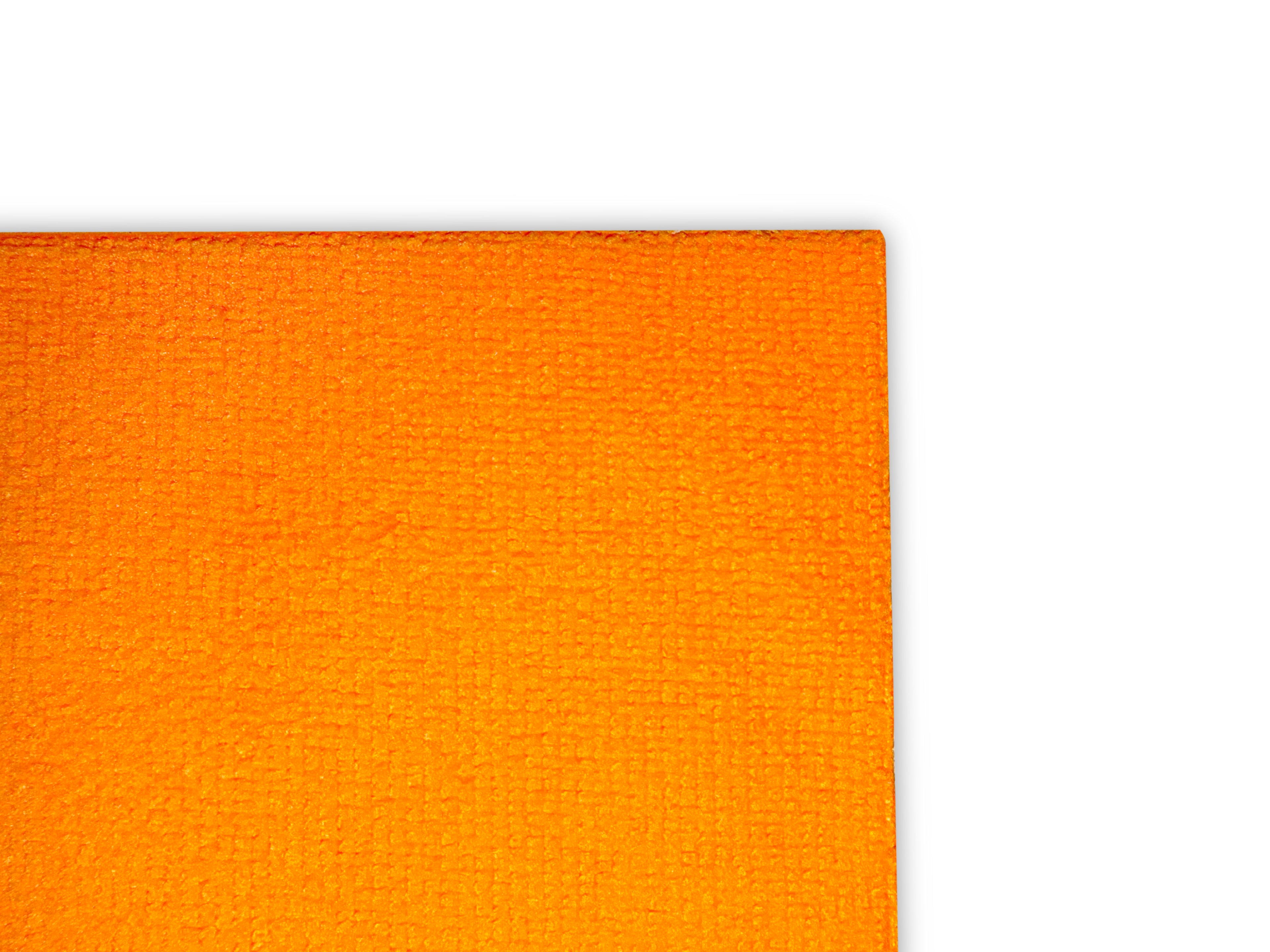 A close-up of a bright orange textured fabric or material corner against a plain white background.