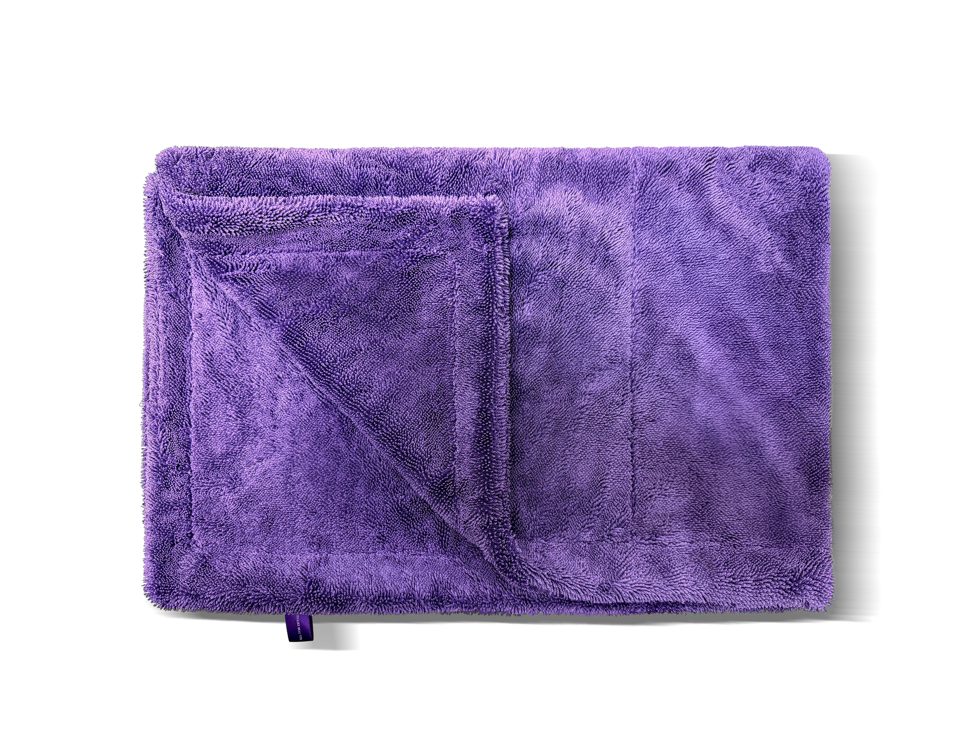 Ultra-absorbent waffle-weave microfiber towel for fast vehicle drying, detailing, and polishing. Its edgeless, lint-free design protects paint, glass, and trim from streaks and scratches.