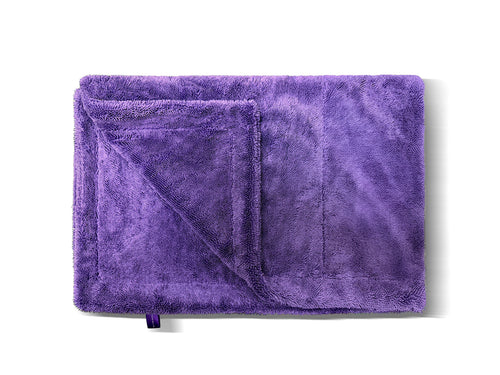 Ultra-absorbent waffle-weave microfiber towel for fast vehicle drying, detailing, and polishing. Its edgeless, lint-free design protects paint, glass, and trim from streaks and scratches.